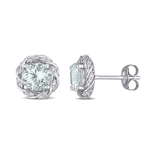 6.0mm Aquamarine and 0.19 CT. T.W. Diamond Swirl Frame Stud Earrings in 10K White Gold