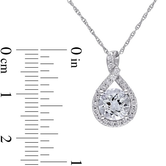 7.0mm Aquamarine and 0.22 CT. T.W. Diamond Twisted Teardrop Pendant in 10K White Gold - 17"