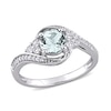 6.0mm Aquamarine, White Topaz and 0.10 CT. T.W. Diamond Tri-Sides Bypass Ring in 10K White Gold