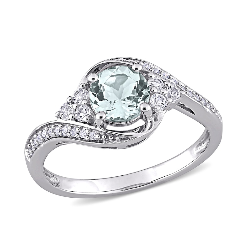 6.0mm Aquamarine, White Topaz and 0.10 CT. T.W. Diamond Tri-Sides Bypass Ring in 10K White Gold|Peoples Jewellers