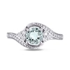 6.0mm Aquamarine, White Topaz and 0.10 CT. T.W. Diamond Tri-Sides Bypass Ring in 10K White Gold