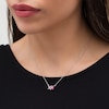 Thumbnail Image 1 of Oval Lab-Created Ruby and White Sapphire "XO" Necklace in Sterling Silver