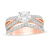 1.69 CT. T.W. Diamond Split Shank Bridal Set in 10K Rose Gold