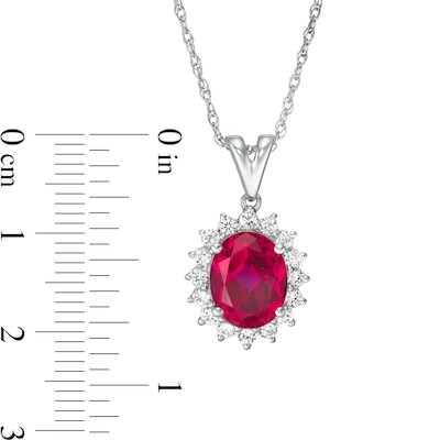 Oval Lab-Created Ruby and White Sapphire Starburst Frame Pendant in Sterling Silver