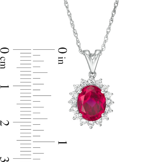 Oval Lab-Created Ruby and White Sapphire Starburst Frame Pendant in Sterling Silver