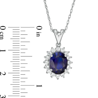 Oval Lab-Created Blue and White Sapphire Starburst Frame Pendant in Sterling Silver