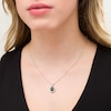 Oval Lab-Created Emerald and White Sapphire Starburst Frame Pendant in Sterling Silver