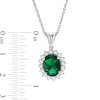 Oval Lab-Created Emerald and White Sapphire Starburst Frame Pendant in Sterling Silver