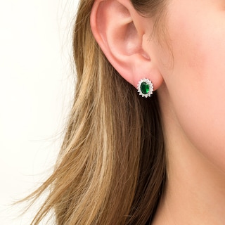 Oval Lab-Created Emerald and White Sapphire Starburst Frame Stud Earrings in Sterling Silver