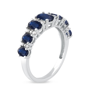 Oval Blue Sapphire and 0.15 CT. T.W. Diamond Graduated Seven Stone Alternating Trios Ring in 10K White Gold