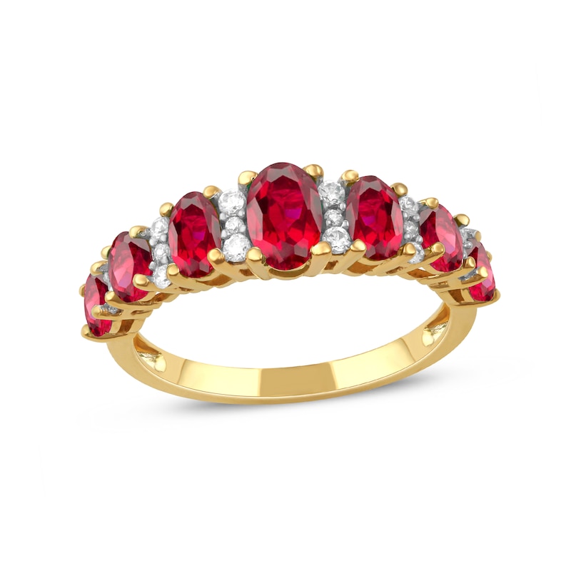 Oval Ruby and 0.15 CT. T.W. Diamond Graduated Seven Stone Alternating Trios Ring in 10K Gold|Peoples Jewellers