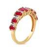 Thumbnail Image 1 of Oval Ruby and 0.15 CT. T.W. Diamond Graduated Seven Stone Alternating Trios Ring in 10K Gold