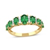 Oval Emerald and 0.15 CT. T.W. Diamond Graduated Seven Stone Alternating Trios Ring in 10K Gold