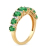 Thumbnail Image 1 of Oval Emerald and 0.15 CT. T.W. Diamond Graduated Seven Stone Alternating Trios Ring in 10K Gold