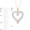 0.45 CT. T.W. Diamond Double Row Ribbon Heart Pendant in 10K Rose Gold