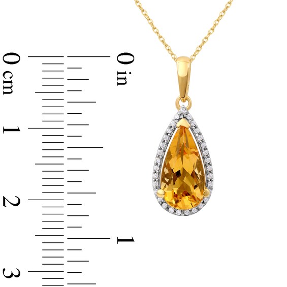 Pear-Shaped Citrine and 0.10 CT. T.W. Diamond Frame Pendant in 10K Gold