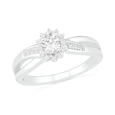 Oval Lab-Created White Sapphire Starburst Frame Crossover Split Shank Ring in Sterling Silver