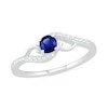 4.0mm Lab-Created Blue Sapphire and 0.04 CT. T.W. Diamond Bypass Split Shank Rolling Wave Ring in Sterling Silver