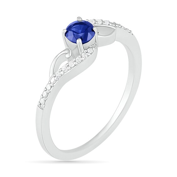 4.0mm Lab-Created Blue Sapphire and 0.04 CT. T.W. Diamond Bypass Split Shank Rolling Wave Ring in Sterling Silver