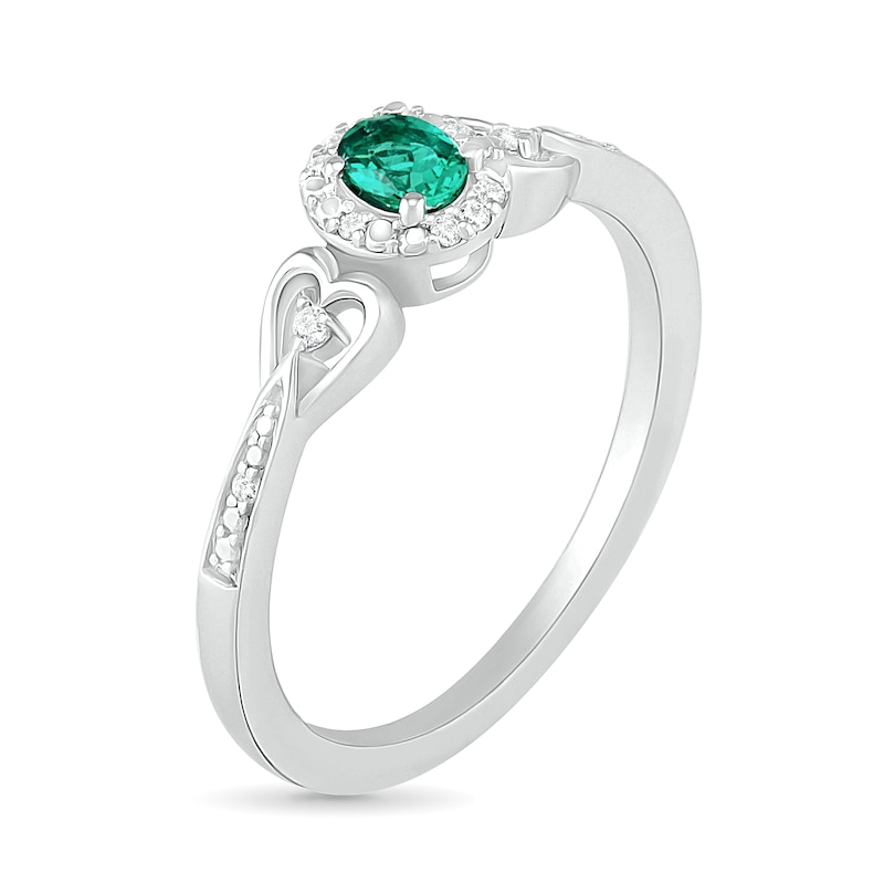 Oval Lab-Created Emerald and 0.04 CT. T.W. Diamond Frame Tapered Heart Shank Ring in Sterling Silver|Peoples Jewellers