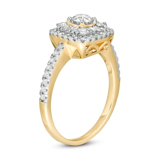 0.69 CT. T.W. Baguette and Round Diamond Cushion Frame Ring in 10K Gold