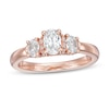 Thumbnail Image 0 of Kleinfeld® 0.95 CT. T.W. Oval Diamond Three Stone Engagement Ring in 14K Rose Gold