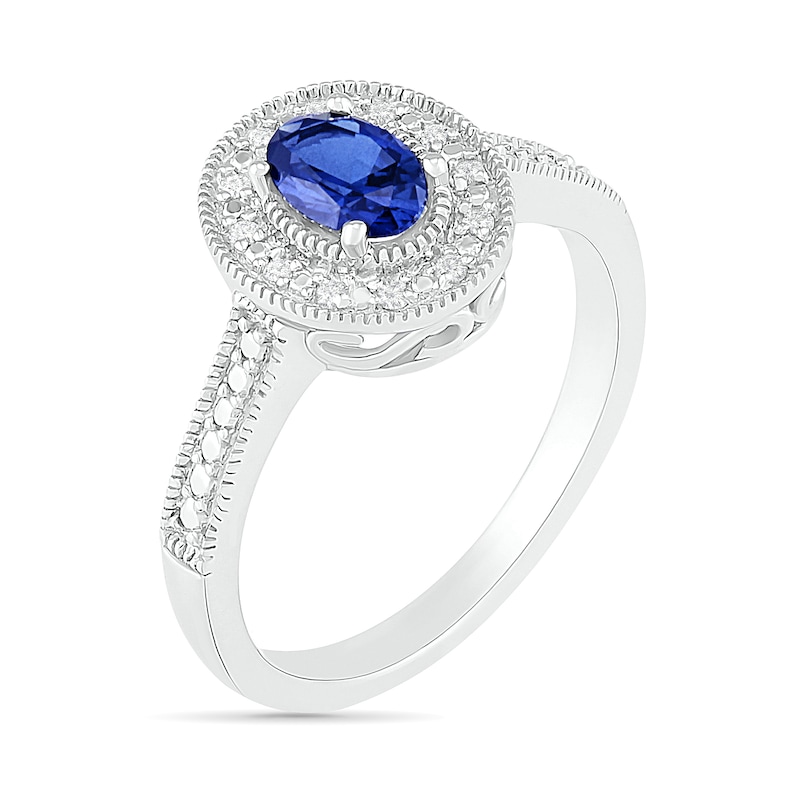 Oval Blue Lab-Created Sapphire and 0.04 CT. T.W. Diamond Frame Vintage-Style Ring in Sterling Silver