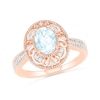 Oval Aquamarine and 0.115 CT. T.W. Diamond Scroll Frame Tapered Shank Vintage-Style Ring in 10K Rose Gold