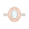 Oval Aquamarine and 0.115 CT. T.W. Diamond Scroll Frame Tapered Shank Vintage-Style Ring in 10K Rose Gold