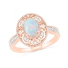 Thumbnail Image 0 of Oval Lab-Created Opal and 0.115 CT. T.W. Diamond Filigree Frame Vintage-Style Ring in 10K Rose Gold