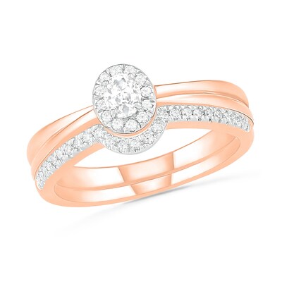 0.29 CT. T.W. Oval Diamond Frame Bridal Set in 10K Rose Gold