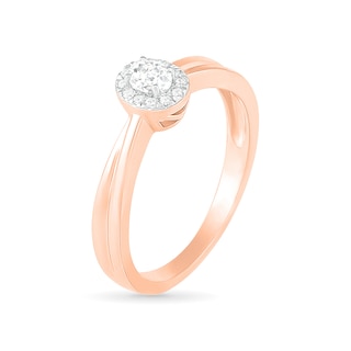 0.29 CT. T.W. Oval Diamond Frame Bridal Set in 10K Rose Gold