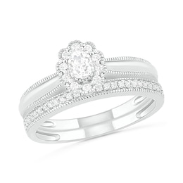 0.29 CT. T.W. Oval Diamond Scallop Frame Vintage-Style Bridal Set in 10K White Gold