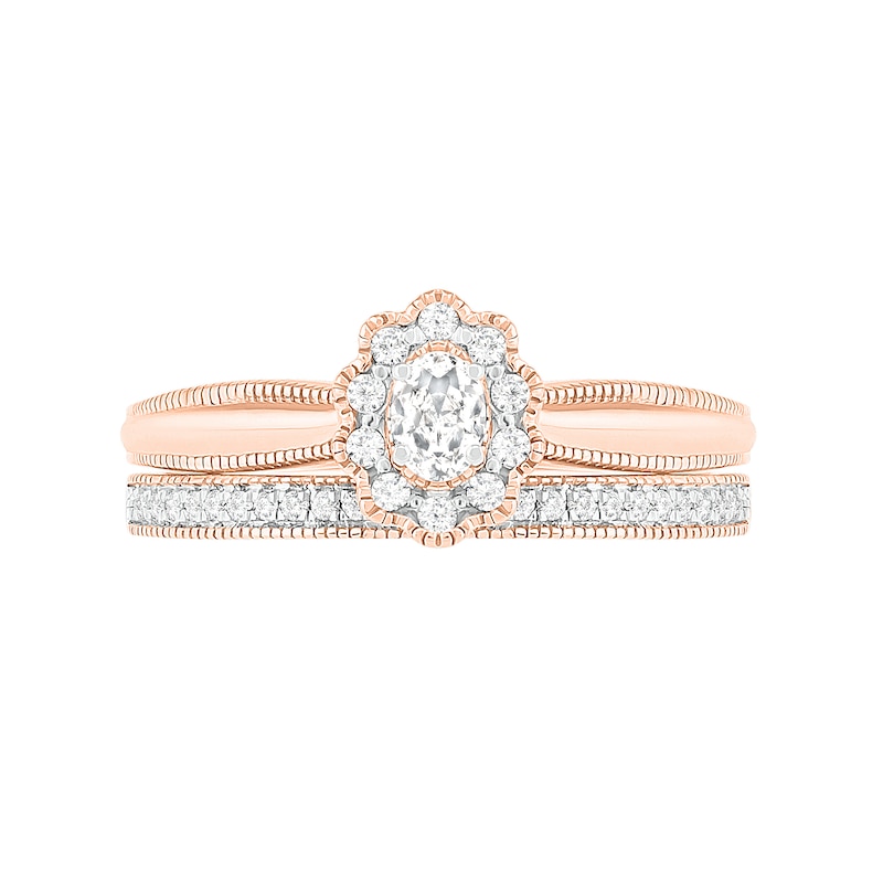 0.29 CT. T.W. Oval Diamond Scallop Frame Vintage-Style Bridal Set in 10K Rose Gold