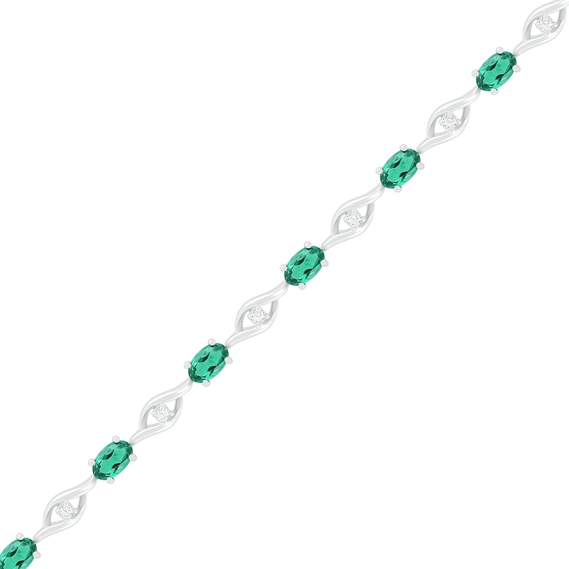 Oval Lab-Created Emerald and White Sapphire Open Flame Link Alternating Line Bracelet in Sterling Silver - 7.25"|Peoples Jewellers