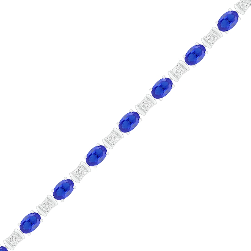 Oval Lab-Created Blue and White Sapphire Barrel Link Alternating Line Bracelet in Sterling Silver - 7.25"