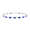 Thumbnail Image 1 of Oval Lab-Created Blue and White Sapphire Barrel Link Alternating Line Bracelet in Sterling Silver - 7.25"