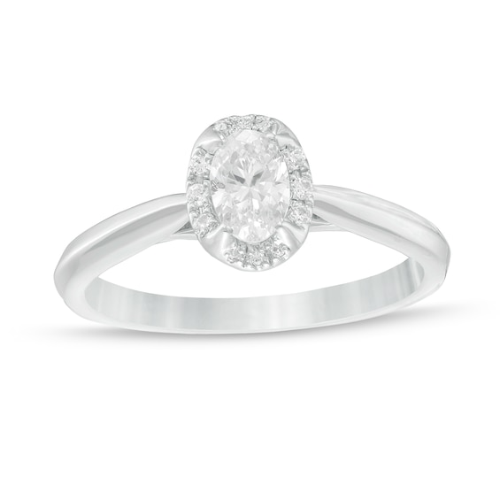 0.62 CT. T.W. Oval Diamond Frame Engagement Ring in 14K White Gold (I/I2)