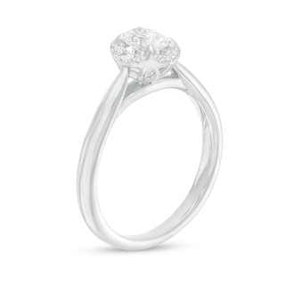 0.62 CT. T.W. Oval Diamond Frame Engagement Ring in 14K White Gold (I/I2)