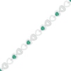 Thumbnail Image 0 of 4.0mm Lab-Created Emerald and 0.18 CT. T.W. Diamond Heart Link Alternating Line Bracelet in Sterling Silver - 7.5"