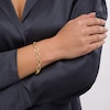 Thumbnail Image 1 of 8.75mm Diamond-Cut Oval Link Chain Bracelet in Hollow 10K Gold - 7.5"