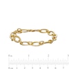 Thumbnail Image 3 of 8.75mm Diamond-Cut Oval Link Chain Bracelet in Hollow 10K Gold - 7.5"