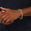 Thumbnail Image 1 of Men's 0.33 CT. T.W. Diamond Open Oval and Bamboo Link Bracelet in 10K Gold - 8.5"
