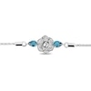 Thumbnail Image 1 of Enchanted Disney Cinderella Pear-Shaped London Blue Topaz and 0.085 CT. T.W. Diamond Bolo Bracelet in Sterling Silver - 9"