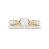 0.95 CT. T.W. Diamond Crossover Bridal Set in 14K Gold