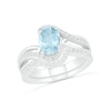 Thumbnail Image 0 of Oval Aquamarine and 0.086 CT. T.W. Diamond Bypass Split Shank Bridal Set in Sterling Silver