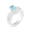 Thumbnail Image 1 of Oval Aquamarine and 0.086 CT. T.W. Diamond Bypass Split Shank Bridal Set in Sterling Silver