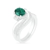 Oval Lab-Created Emerald and White Sapphire Side Accent Double Bypass Split Shank Bridal Set in Sterling Silver