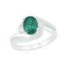 Oval Lab-Created Emerald and White Sapphire Side Accent Double Bypass Split Shank Bridal Set in Sterling Silver