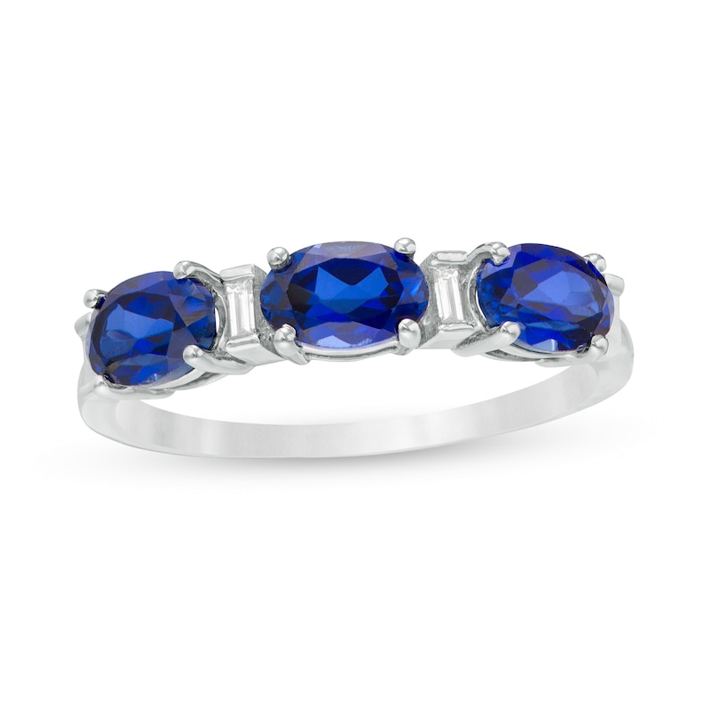 Oval Lab-Created Blue Sapphire and Baguette Diamond Accent Three Stone Ring in Sterling Silver|Peoples Jewellers